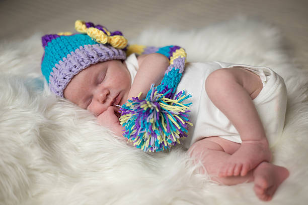 istock Baby with hat on fur 509916612
