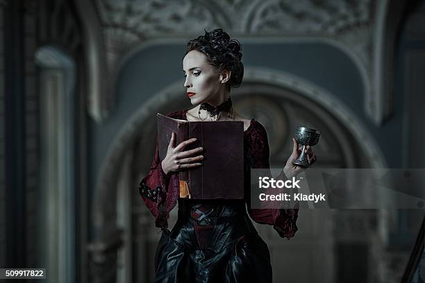 Mystic Woman With A Book Stock Photo - Download Image Now - Witch, Vampire, Book