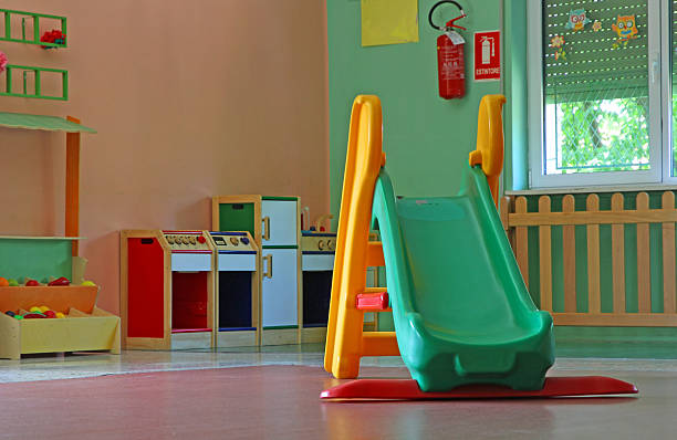 istock slide and games inside a school for young children 509917955