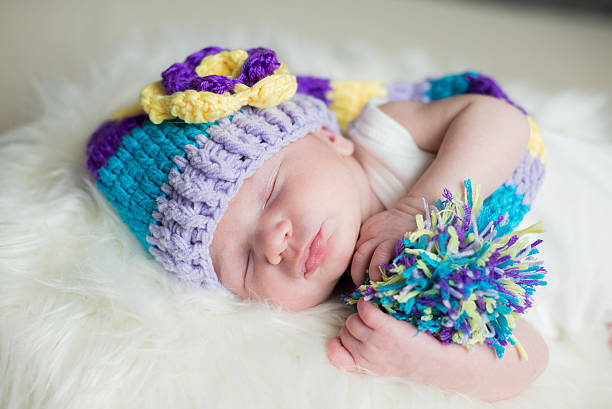 istock Baby with hat on fur 509918054