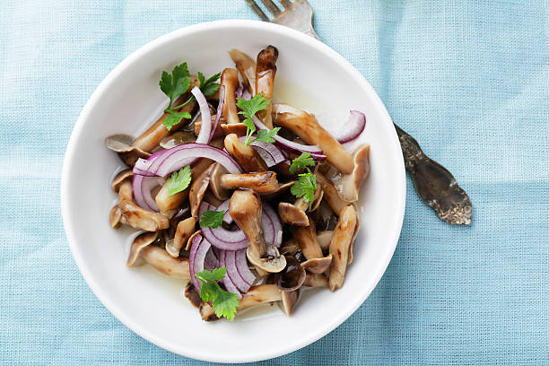 istock mushrooms salad in white bowl 509918938
