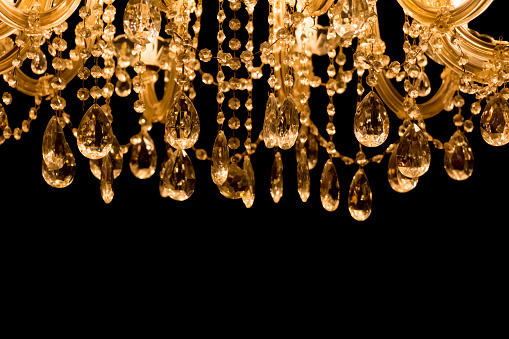 Gallant chandelier with black background and bottom copyspace