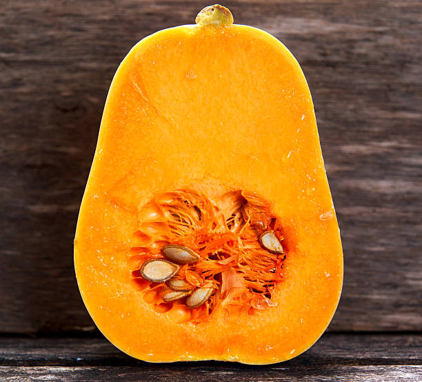 istock Fresh butternut squash slice on wooden table 509923026