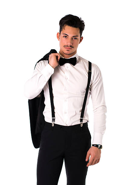 istock Handsome elegant young man with suit, bow-tie and moustache 509923397