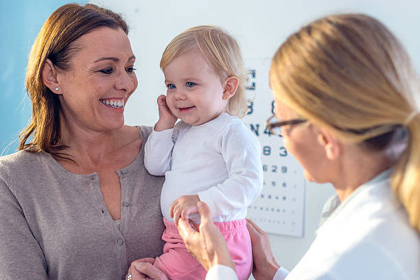 istock Mother with her baby visiting pediatrician 509924440