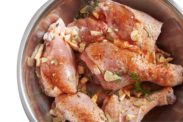 istock Chicken legs raw. Isolated white background. 509924490