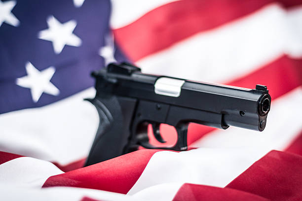 istock Gun with USA flag 509926414
