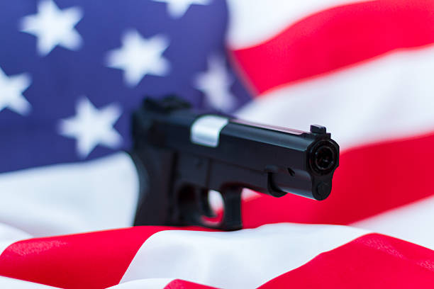 istock Gun with USA flag 509926654