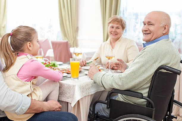 istock Cute friendly family is dining in restaurant 509926992