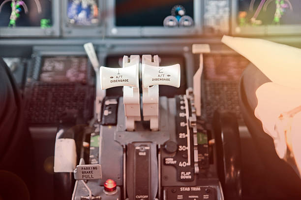 istock Throttle levers, ready to go. Jet airliner cockpit. 509928450