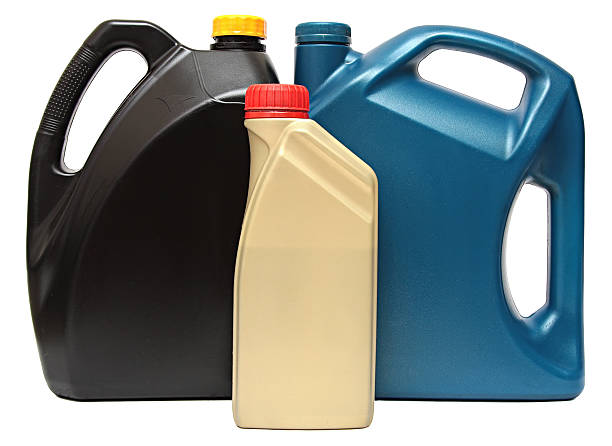 istock Plastic bottles from automobile oils isolated on white background 509935486