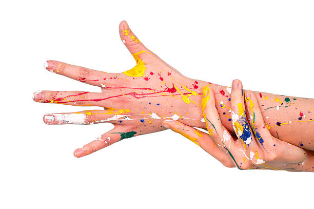 istock Woman hands in paint make a free shape 509935630