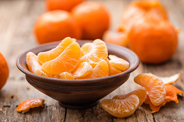 tangerines - healthy eating breakfast ripe fruit photos et images de collection