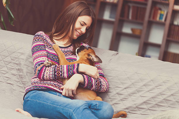 istock Woman with a puppy 509936856