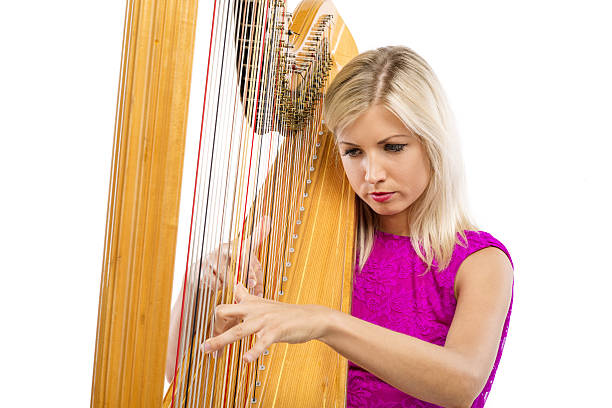 istock Woman with harp 509957669