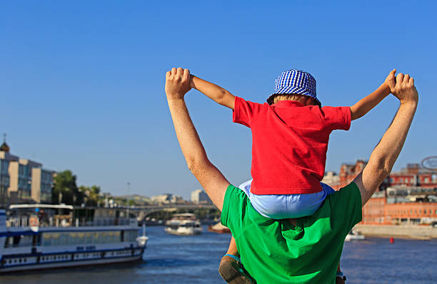 father and son having fun in summer
