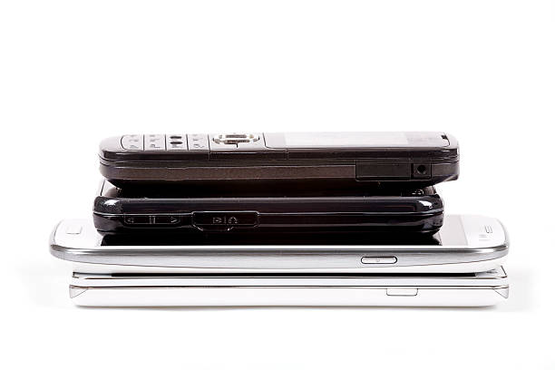 istock Stack of older model cell phones and smartphones 509957921