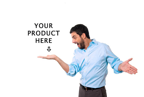 istock happy business man showing blank copy space above palm hand 509958731