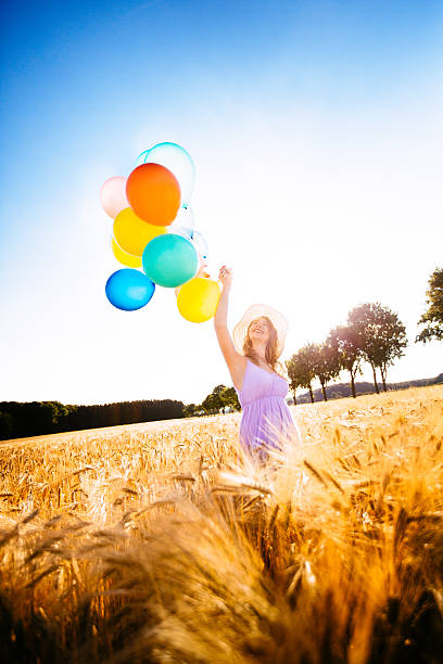 istock Girl in Wheat Field 509959491