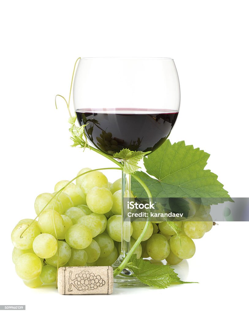 Red wine glass and grapes Red wine glass and grapes. Isolated on white background Alcohol - Drink Stock Photo