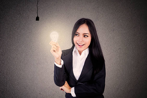 istock Businesswoman get light bulb 509961831