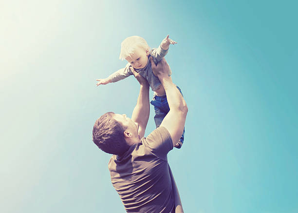 istock Vintage photo happy father and son having fun 509979111