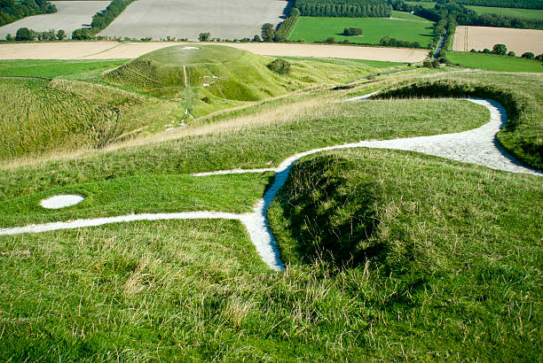 Uffington White Horse and Dragon Hill View of dragon Hill from the top of Uffington White Horse uffington horse stock pictures, royalty-free photos & images