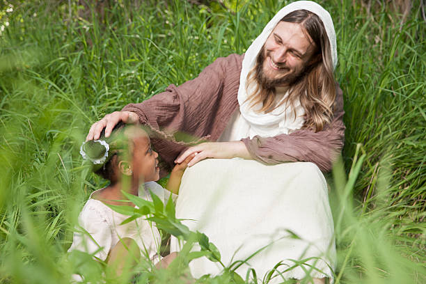 istock Child Girl with Jesus Christ 509988678