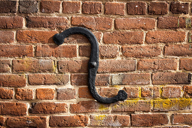 istock S-Shaped Wall Anchor on Outside of Brick Building 509991412