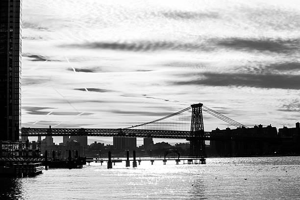 Williamsburg bridge in black and white Williamsburg bridge is one of the bridges that connect Brooklyn with Manhattan williamsburg bridge photos stock pictures, royalty-free photos & images