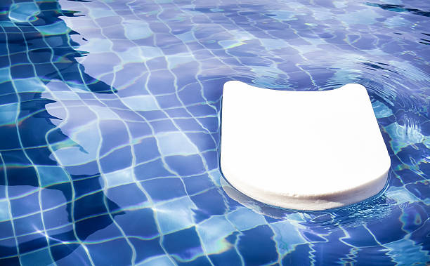 istock Swim board and rippled water in swimming pool 509996178