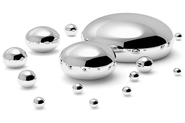 Hg, mercury metal drops Shiny mercury metal drops and droplets isolated on white background, Hg metal sphere stock pictures, royalty-free photos & images