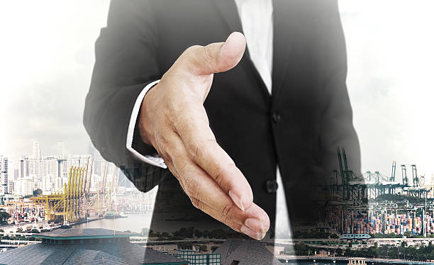 istock Businessman extending hand with capital city background, selective focus 509996468