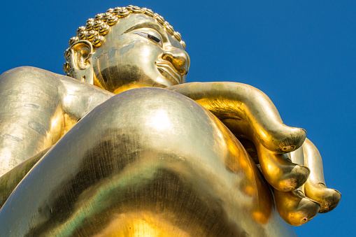 The golden Buddha statue located at golden triangle point of Chiang-saen district of Thailand.
