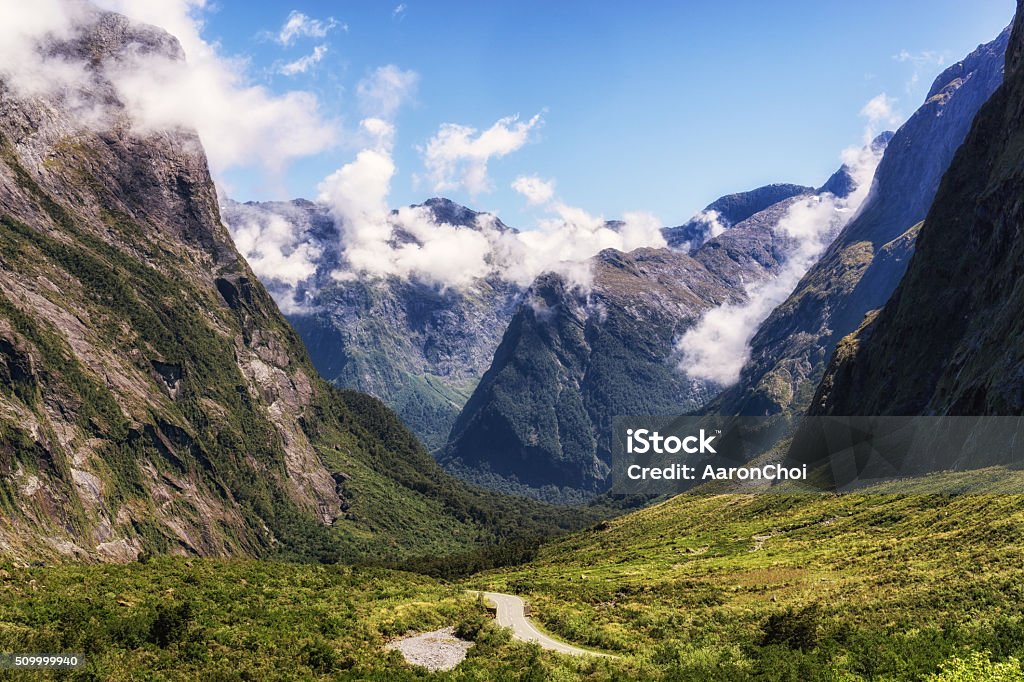 milford road along cleddau valley milford road along cleddau valley with the view of fiordland national park. Taken during summer in new zealand. Beauty Stock Photo