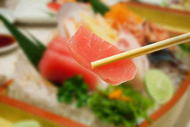 istock japanese sashimi tuna with sashimi set background 510000510