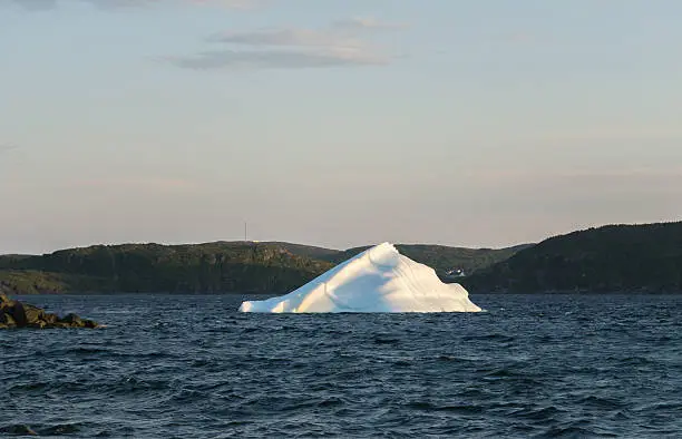 Photo of Newfoundland Iceberg Shines at Sunset
