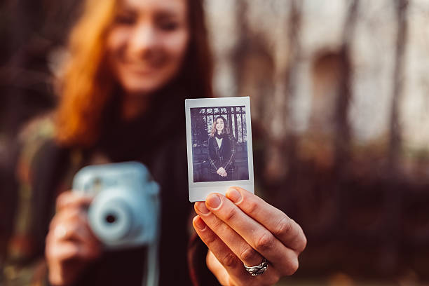 istock Woman showing instant selfie 510005540