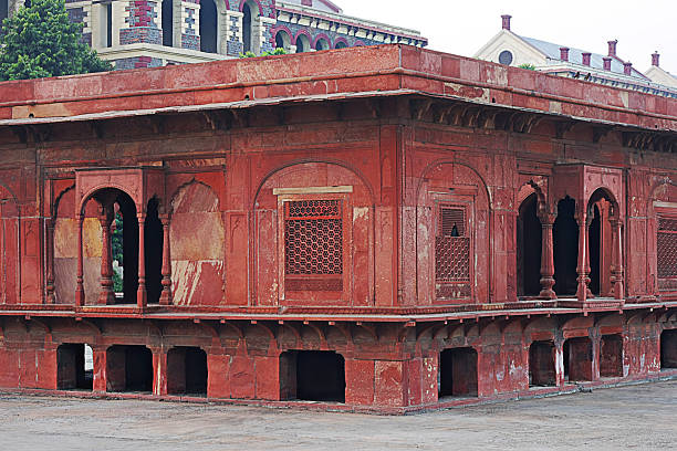 Old Delhi, India: Red Fort, Named for its massive enclosing walls of red sandstone, was the residence of the Mughal emperor of India . Architectural detail of the Arches. 