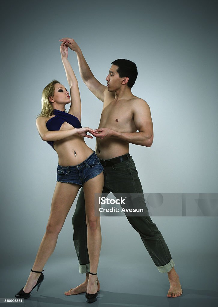 Dancing man and woman Man and woman dancing modern expressive dance Activity Stock Photo