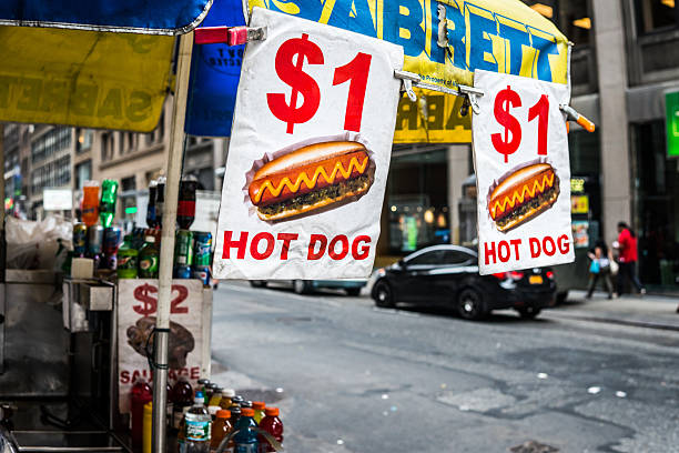 New York City, New York, USA - August 1, 2014: Fast Food stand at 42nd st. new york city street, advertising hotdogs for $1.00