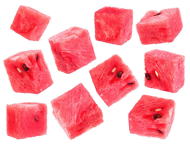 Watermelon fruit cube slice Watermelon fruit cube slice closeup isolated on white background cube shaped watermelon pictures stock pictures, royalty-free photos & images