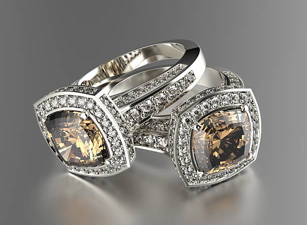 istock Ring with Cognac Diamond. Jewelry background 510007413