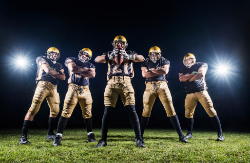 american Football Player with uniform and american flag proud of his country, on a white background