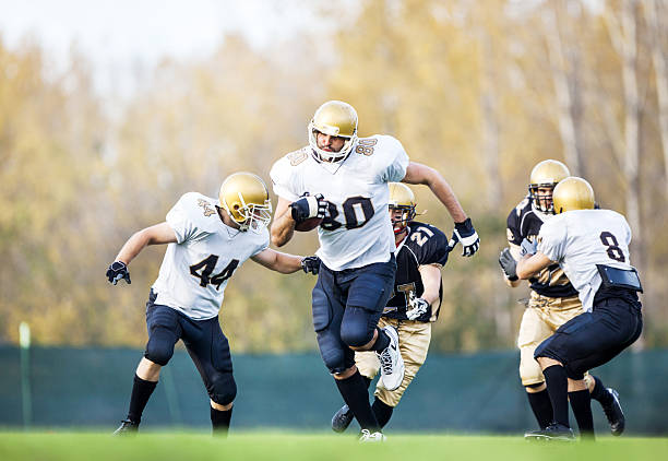 istock American football action on playing field. 510007613