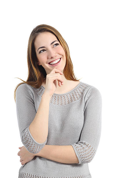 istock Happy woman thinking and looking sideways 510010919