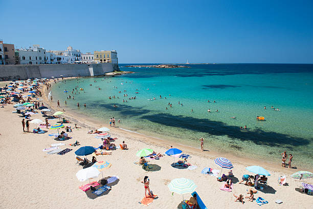 The seaside town of Gallipoli, whose name means Beautiful City, rests like a mirage on the Ionian coast, roughly 40 km from Lecce.