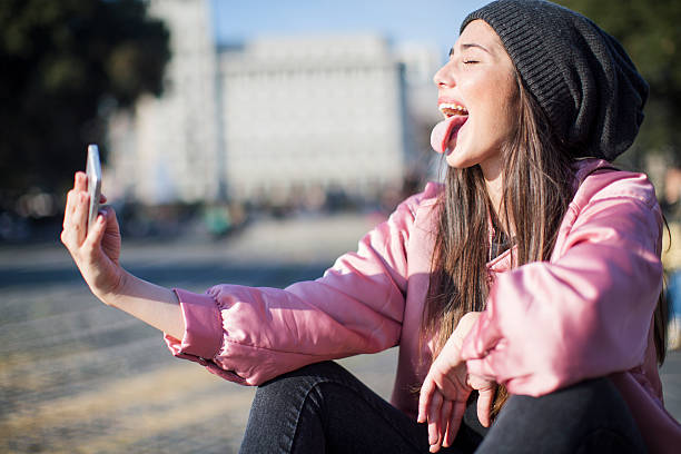 istock Young woman with smart phone in Barcelona, technology. 510011014