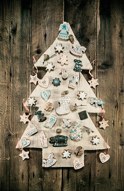 istock Christmas decoration: wooden carved tree decorated with gingerberbread. 510012897