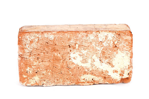 Red bricks isolated on white background. Solid clay bricks used for construction.